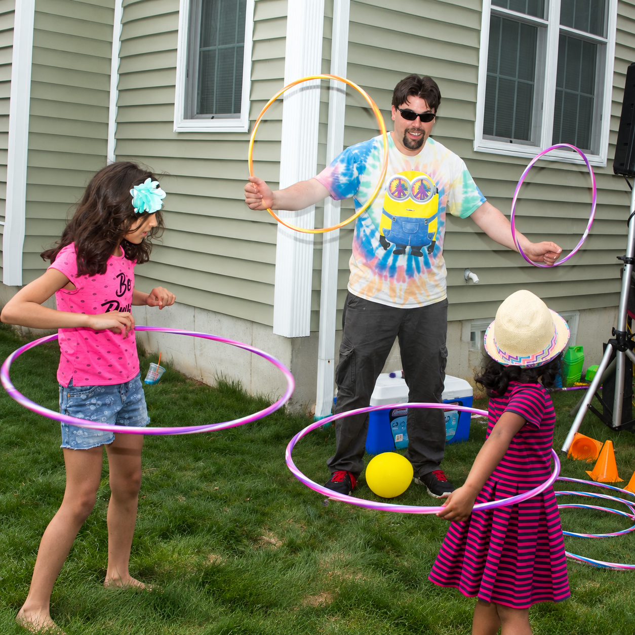 Children using hula hoops during a Bubble Party Pros event in Massachusetts