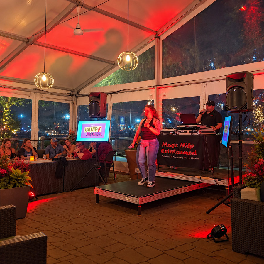 Karaoke singer performing with Magic Mike Entertainment at a live Massachusetts event